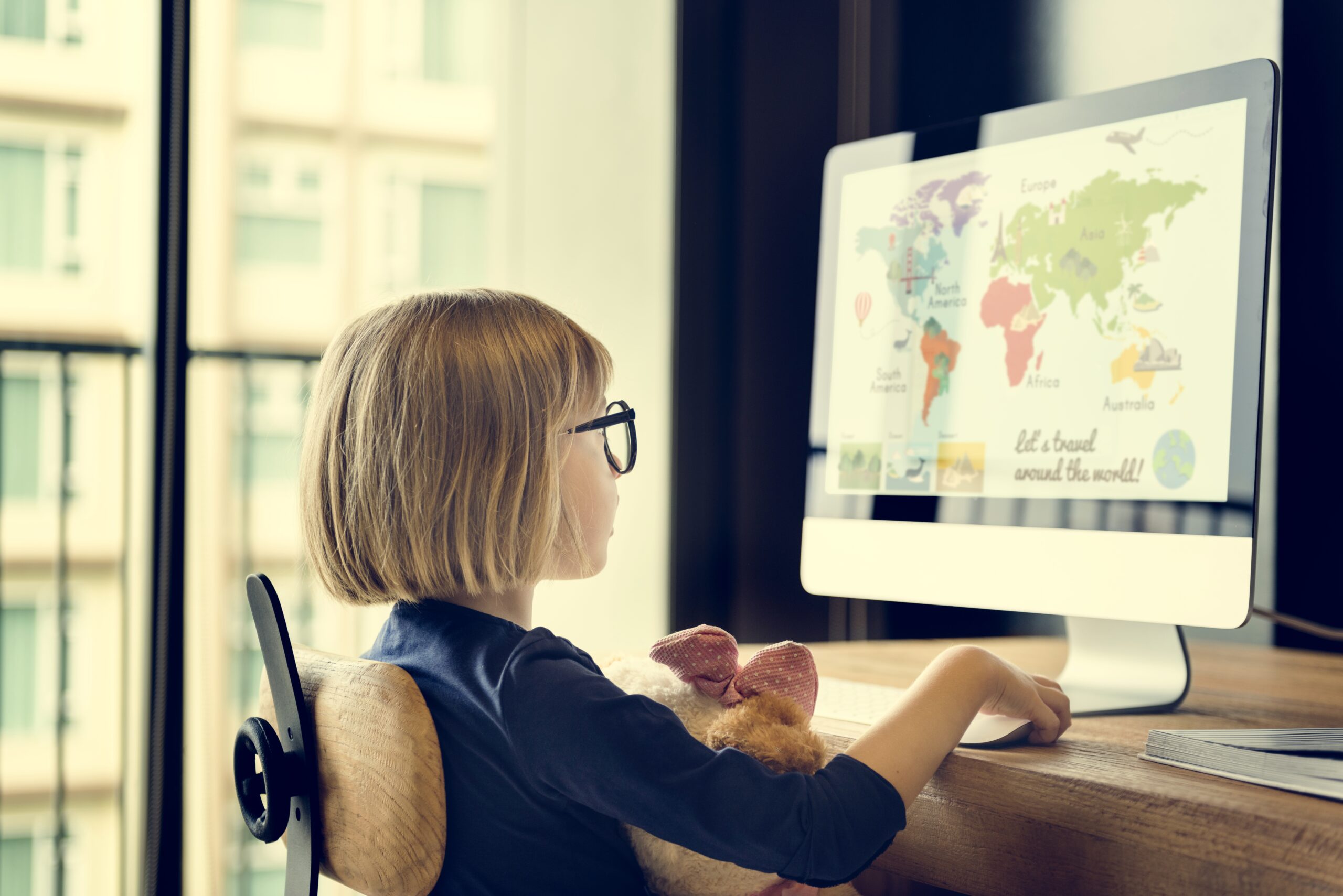 Little Girl Using Computer Concept